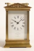Early 20th century brass carriage clock, dial marked by A. Pooley & Son, Ealing, h.13.5cm.
