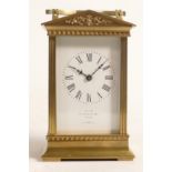 Early 20th century brass carriage clock, dial marked by A. Pooley & Son, Ealing, h.13.5cm.