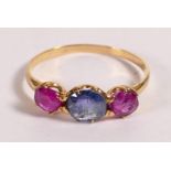 Ancient looking sapphire & ruby 3 stone ring, set in very high carat gold. The old cut primitive