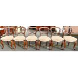 Set of six Victorian rosewood dining chairs on cabriole legs. (6)