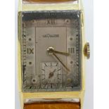 Jaeger-Lecoultre 14ct hallmarked gold ladies tank shape wrist watch, on Ostrich leather strap.