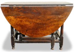 19th century oak drop leaf table with drawer, top diameter opened 129cm, length 87cm & height 74cm.