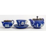 Wedgwood dip blue items to include - small tea pot, cup & saucer set and milk jug, tallest 10cm (3)