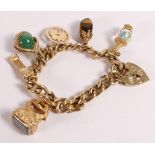 9ct gold bracelet, with 6 quality 9ct charms, 4 set with precious stones, gross weight 65g