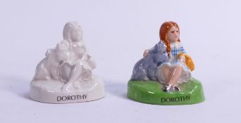 Wade Wizard of Oz Dorothy figure in two colourways, height 6.5cm. These were removed from the