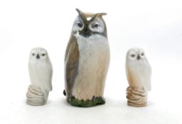 Royal Copenhagen model of an owl 2999 and a pair smaller Snowy owls 1741, tallest h.15cm. (3)