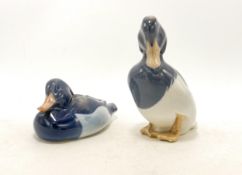 Royal Copenhagen model of a seated duck 1924 and standing duck 1941, h.12cm. (2)