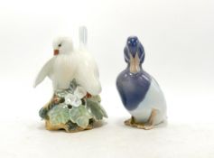 Royal Copenhagen model of a pair of doves 402 and duck 1941, h.13.5cm. (2)