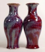 Two Sang de Bouf Chinese vases, height 25cm. (2)