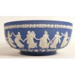 A Wedgwood white on Royal / Saxon Blue Jasper large bowl. Decorated with Dancing Hours and