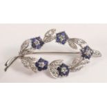 Diamond and sapphire brooch of high quality set in high carat white gold or platinum. Gross weight