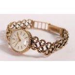 9ct gold Ladies Tudor Royal wristwatch with 9ct gold Rolex rope twist bracelet, gross weight 21.9g.