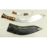 20th century or earlier Indian subcontinent Kukri knife, with two smaller blades, in leather sheath.