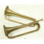 Two American brass bugles, one with US motif & the other a Boosey & Co. 1916 item, length 43cm (2)
