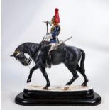 A Michael Sutty limited edition porcelain military figure"Farrier Corporal", limited edition of