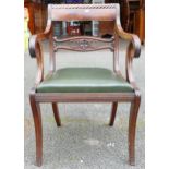 Regency mahogany armchair with leather seat.