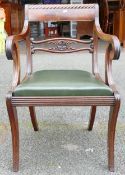 Regency mahogany armchair with leather seat.
