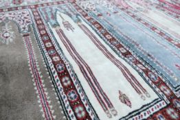 Tasselled hand tied Turkish rug, 165cm x 89cm