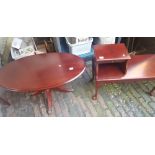 Oval occasional table together with a telephone table (2).