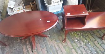 Oval occasional table together with a telephone table (2).