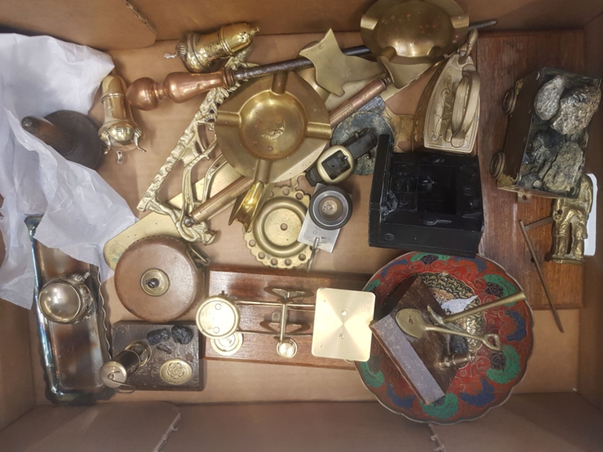 A mixed collection of metal ware items to include postage scales, mining ornaments, horse brasses,