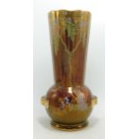 Large Crown Devon lustre vase decorated with flowers and butterfies. Height 30cm