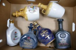 A collection of Wade Whiskey & Spirit Ceramic bottles to include Dimple, Harvey Sherry, Buchanan's