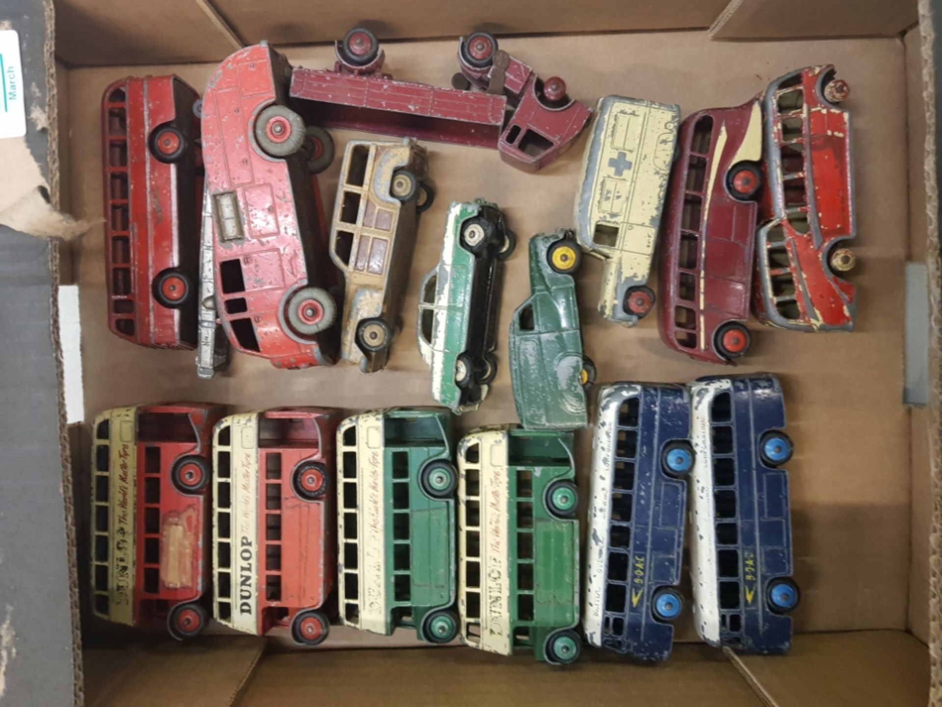 A collection of vintage play-worn Dinky vehicles.