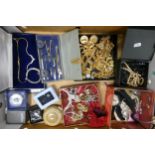 A collection of quality costume jewelry including Wedgwood Compact & Necklace, Necklaces, Chains,