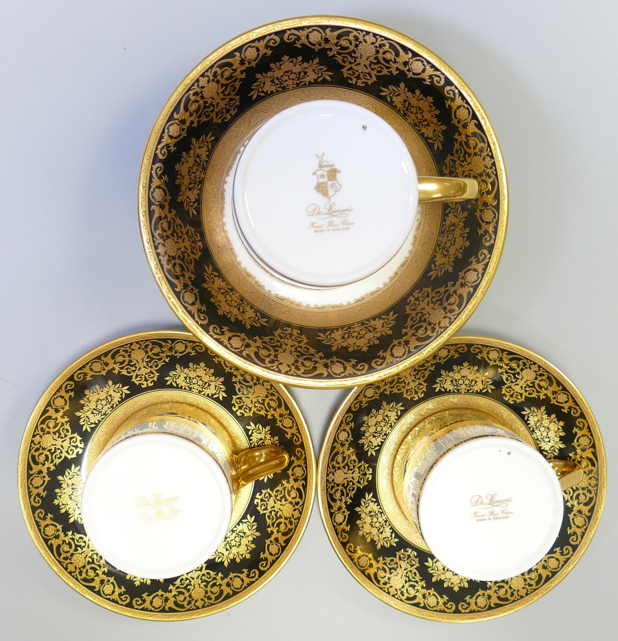 De Lamerie Fine Bone China heavily gilded Black Exotic Garden patterned cup & saucer sets & small - Image 2 of 2