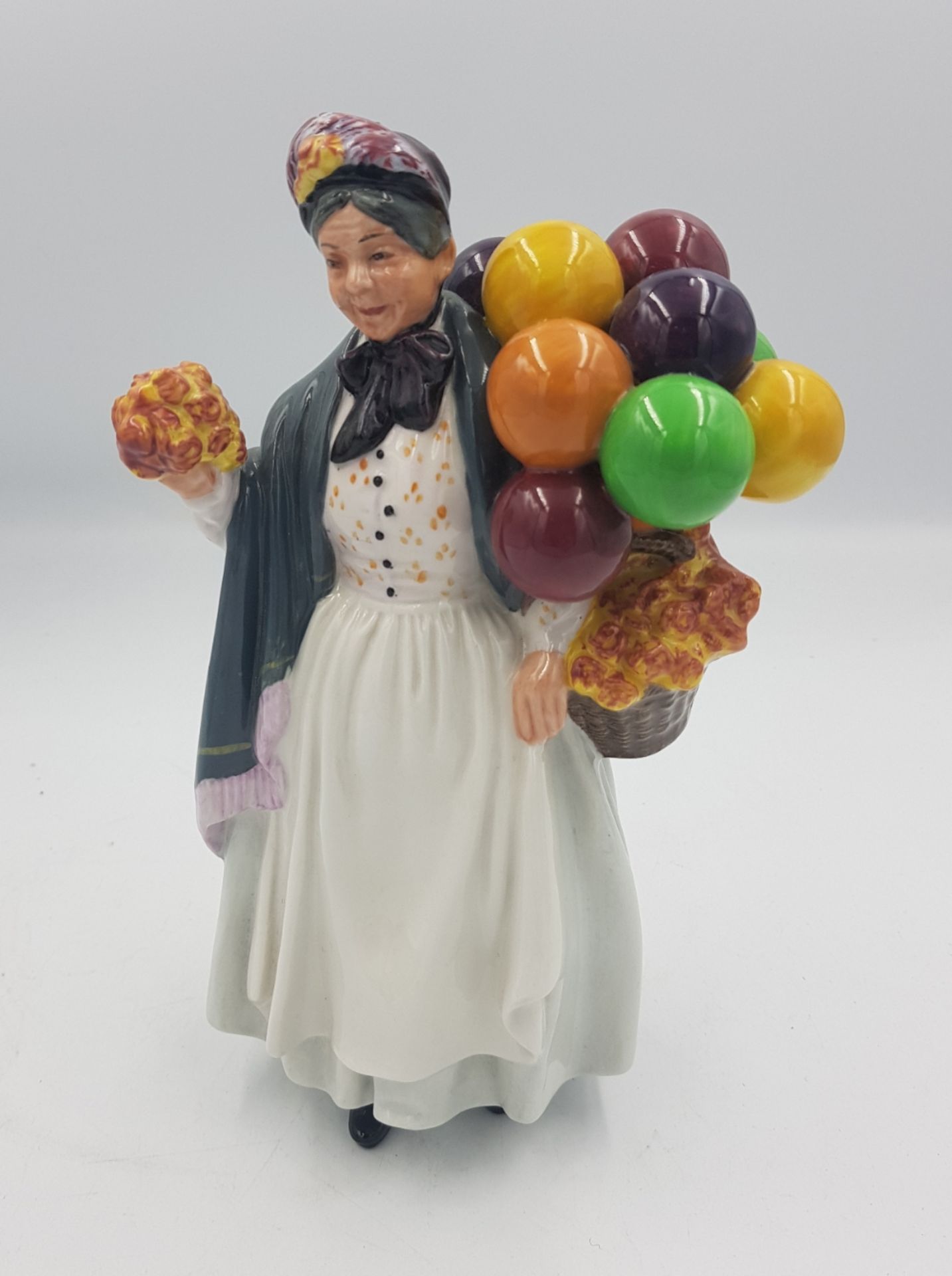 Royal Doulton seconds character figure Biddy Penny Farthing HN1843.