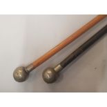 Two military type swagger sticks