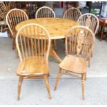 Large circular Pine farmhouse dining table together with 2 vintage elm spindle back chairs & 4