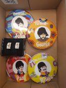 Cased pair of Beatles Yellow Submarine cufflinks together with set of 4 Yellow Submarine coasters (