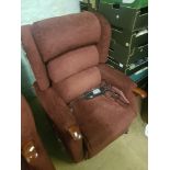 Rise and recline Ladies armchair in burgundy fabric.