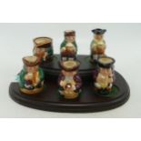 Royal Doulton set of tiny Toby jugs comprising Old Charley D6978, Happy John D6979, Toby XX D6975,