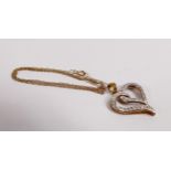 9ct gold diamond heart shaped pendant and chain, 2.2g.