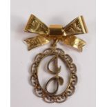 9ct gold bow brooch/pendant, 4.8g.