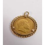 Gold half sovereign dated 1903 mounted in 9ct gold mount, 6.3g.