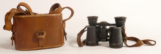 A pair of cased Zeiss Jena turolem binoculars - some pushed in areas around eyepiece.