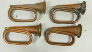 Four Vintage Copper Bugles, length of largest 27cm(4)