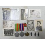 Pair of medals Victory & Defence, with photographs & badges awarded to a woman.