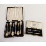 Set of Silver spoons, pair of Silver forks, both sets boxed, 68.5g. (2)