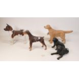 A collection of Wade Ceramic Northlight Figures of Dogs, tallest 16cm. These were removed from the