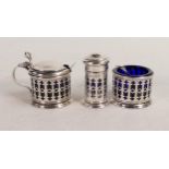 Three piece silver cruet set with blue glass liners and 2 spoons. Weighable silver 60.4g