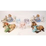 A collection of Wade Ceramic Northlight Figure of Horses , Dogs & Children. These were removed