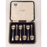 Cased set of six Arts & Crafts tea spoons, 54.7g.