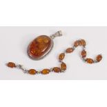 Hallmarked silver large faux amber set pendant, and similar bracelet (needs single silver jump