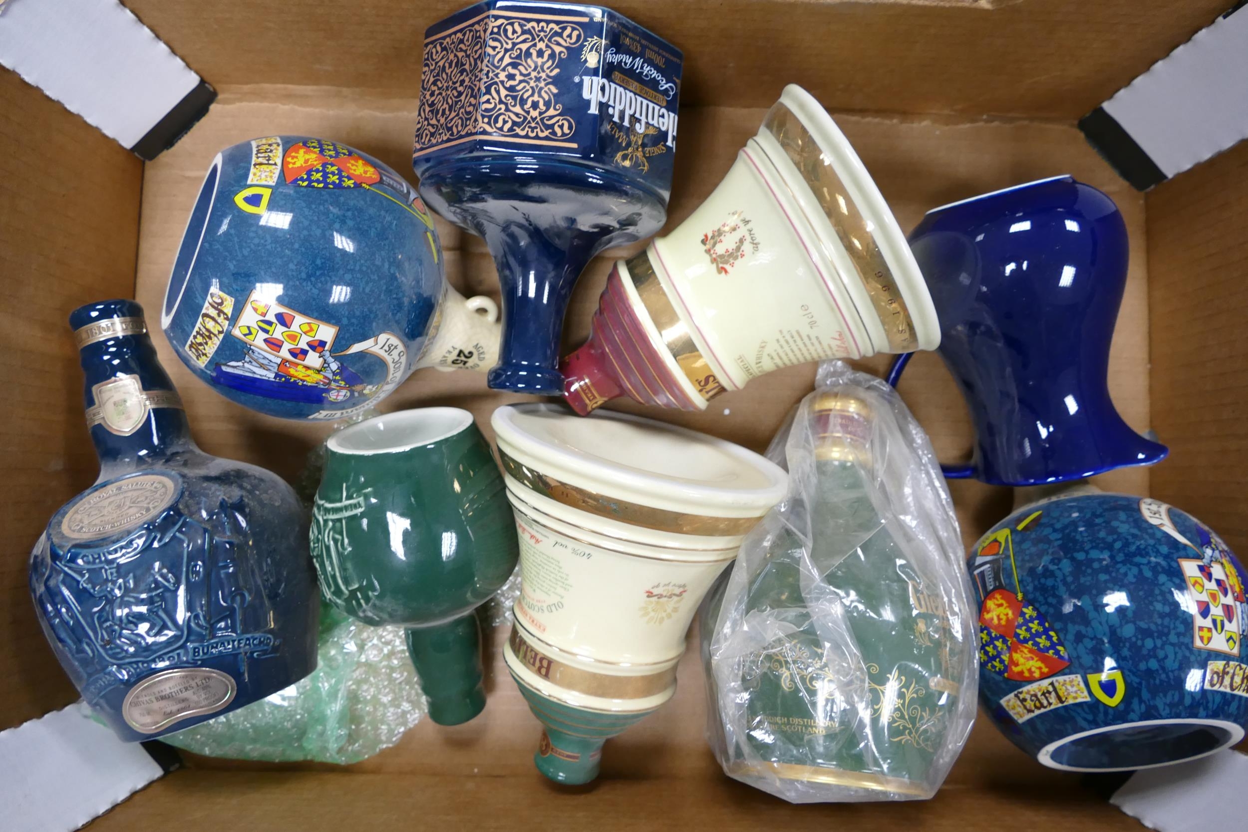 A collection of Wade Ceramic Whiskey & Spirit Bottles /decanters to include Glenfiddich ,The Black