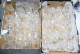 A large collection of cut glass & crystal including brandy glasses, wine, tumblers etc (2 trays)